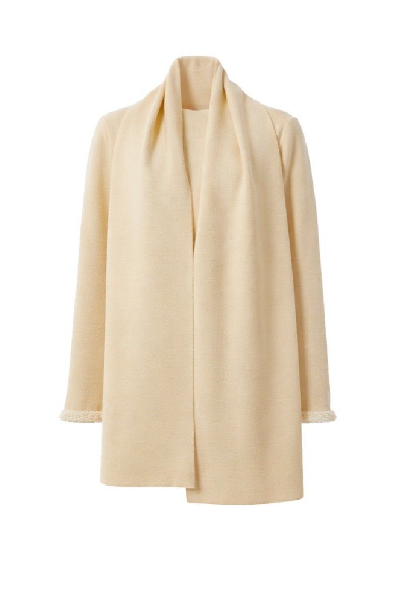 Neutral beige wool sweater on a ghost mannequin, showcasing DELEGAN's cozy and stylish knitwear for cold weather.