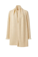 Neutral beige wool sweater on a ghost mannequin, showcasing DELEGAN's cozy and stylish knitwear for cold weather.