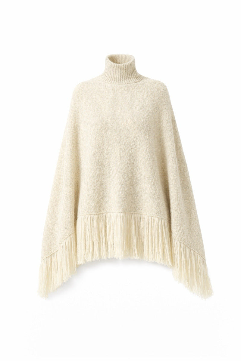 Cream-colored milk blush cardigan poncho by DELEGAN displayed on a ghost mannequin, front view showcasing soft knit texture.