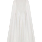 White maxi skirt with hand-embroidered tie from DELEGAN displayed on a ghost mannequin front.