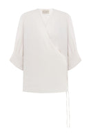 White DELEGAN blouse with tight sleeves displayed on a ghost mannequin, showing front view and fitted style.