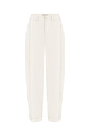 White DELEGAN pants displayed on a ghost mannequin, front view showing slim fit design and clean, modern style.