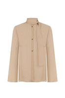 Nude gold long sleeve blouse by Delegan displayed on a ghost mannequin, showcasing a sleek, elegant design.