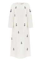 Ivory midi dress with white ornamental details on a mannequin, featuring a fitted bodice and flowing skirt by DELEGAN.