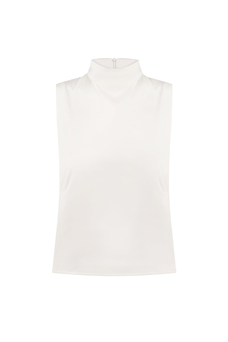 Cream pearl silk high neck top by DELEGAN displayed on a ghost mannequin, showcasing the elegant high neckline and smooth silk fabric.