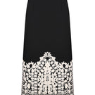 DELEGAN PLAKHTA filigree midi skirt displayed on a ghost mannequin, showcasing intricate details and elegant midi length.