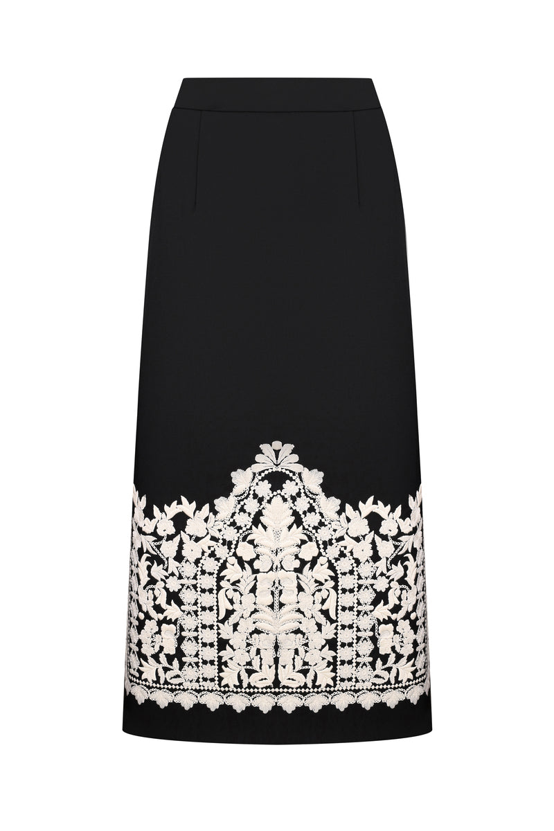 DELEGAN PLAKHTA filigree midi skirt displayed on a ghost mannequin, showcasing intricate details and elegant midi length.