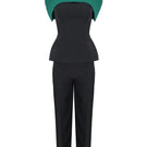 Joanna Andraos midnight black co-ords set featuring top and pants with a detachable emerald cape, front view.