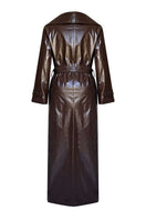 Brown faux leather trench coat by Gigii's, stylish and lightweight, shown on a model with classic collar and belted design.