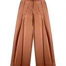 Brown satin pants by Gigii's, featuring a sleek, smooth fabric and tailored fit, shown on a model.