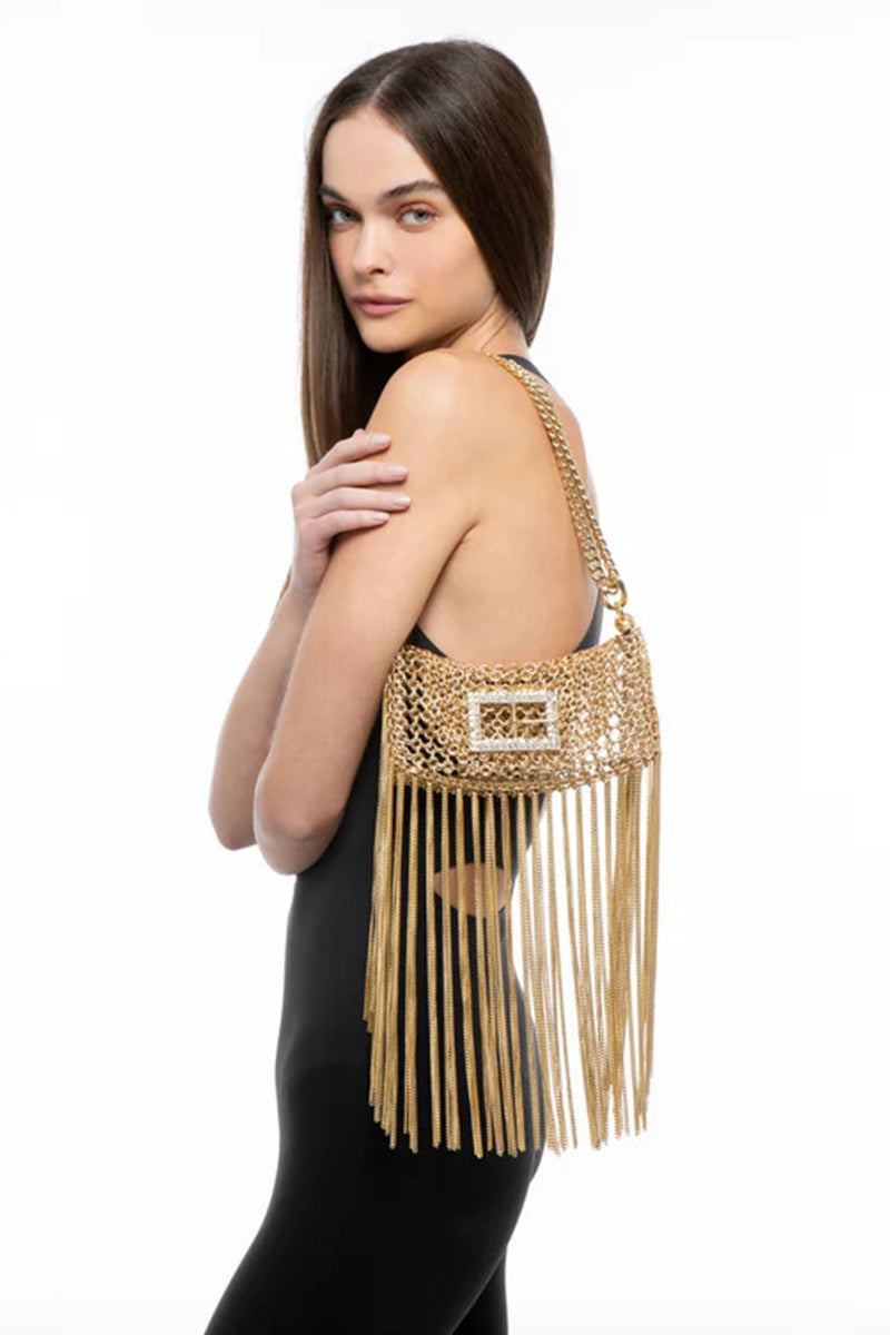 Gold Silvia Gnecchi Rodeo Bag in gold shoulder bag with sleek design and gold-tone hardware, stylishly displayed.