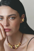 Jude Benhalim Gravity Ear cuff earrings, sleek and modern silver ear cuff with minimalist design, worn on the ear.