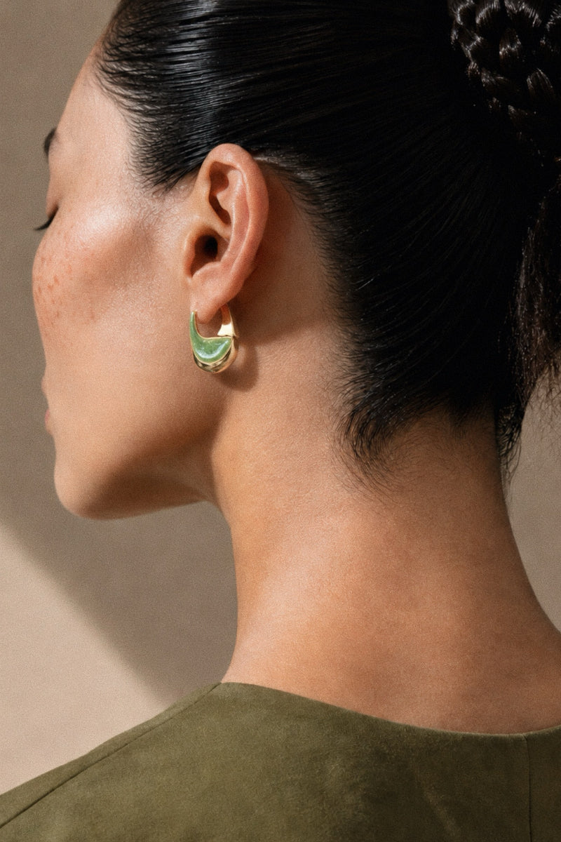 Green mini tummy hoops earrings by Sara & Flora, featuring small hoop design with vibrant green color and trendy style.
