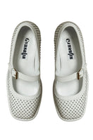 White Gvasalia Mary Jane platform heels with gem embellishments, showcasing a stylish and elegant design.