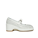 White Gvasalia Mary Jane platform heels with gem accents, stylish and elegant footwear for women.