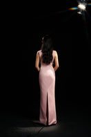 Hacchic Couture blush pink sequin bow body fit gown with elegant design and fitted silhouette, perfect for formal occasions.