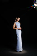 Sky blue ELCITRA silver bow body fit gown by HACCHIC COUTURE, showcasing a sleek silhouette and elegant design.