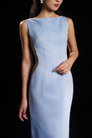 Sky blue ELCITRA silver bow body fit gown by HACCHIC COUTURE, featuring a sleek silhouette and elegant design.