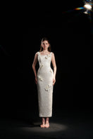 Mindy floral sequin gown in ivory pearl by HACCHIC COUTURE, featuring intricate floral embellishments and elegant design.