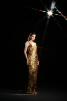 Gold sequin strap gown by HACCHIC COUTURE featuring a fitted silhouette and elegant neckline, perfect for formal occasions.