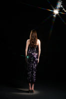 Purple Kiflin sequin strapless gown by HACCHIC COUTURE, featuring a fitted silhouette and shimmering sequins.