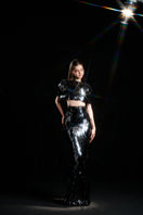 Black Dannie Sparkle Crop Waist Set gown by HACCHIC COUTURE featuring a fitted crop top and high-waisted skirt.
