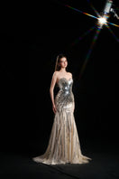 HACCHIC COUTURE NYX dripping sequin strapless gown in nude silver, featuring a fitted bodice and flowing skirt.
