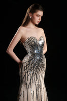 HACCHIC COUTURE nude silver dripping sequin strapless gown with fitted bodice and flowing skirt, elegant evening wear.