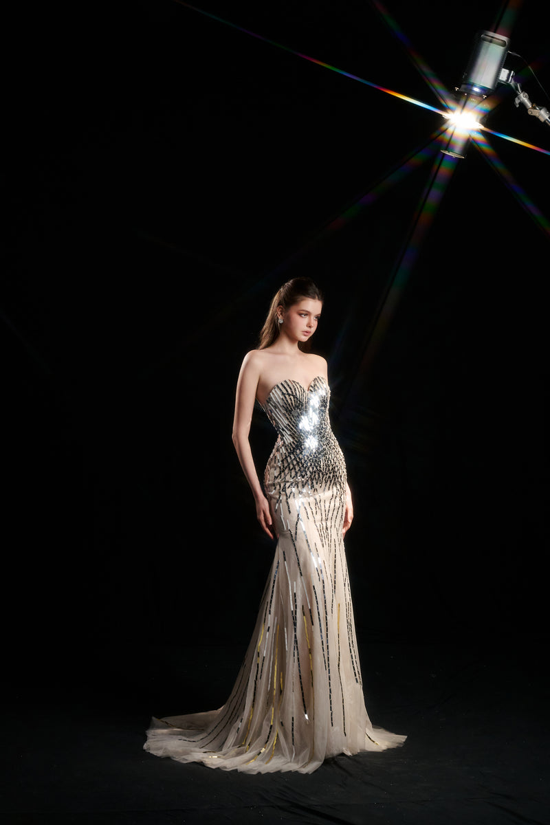 HacChic Couture NYX dripping sequin strapless gown in nude silver, featuring shimmering sequins and elegant strapless design.