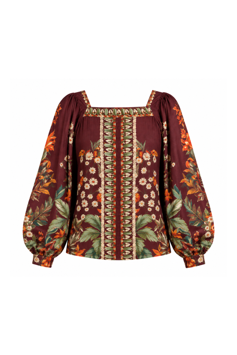 Raishma Harlow Top, stylish women's blouse with intricate detailing and a flattering fit, shown in a close-up image.
