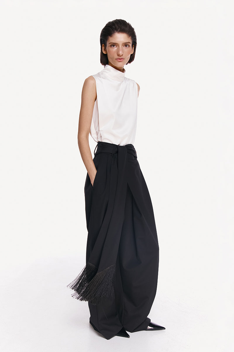 High-resolution image of DELEGAN BAKHROMA pants showing their stylish design and comfortable fit.