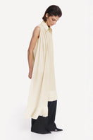 Warm ivory shirt scarf with silk fringe from DELEGAN, featuring soft fabric and elegant detailing, perfect for stylish layering.
