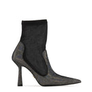 Black disco suede heeled boots by House of Atana featuring a stylish design, perfect for trendy fashion statements.