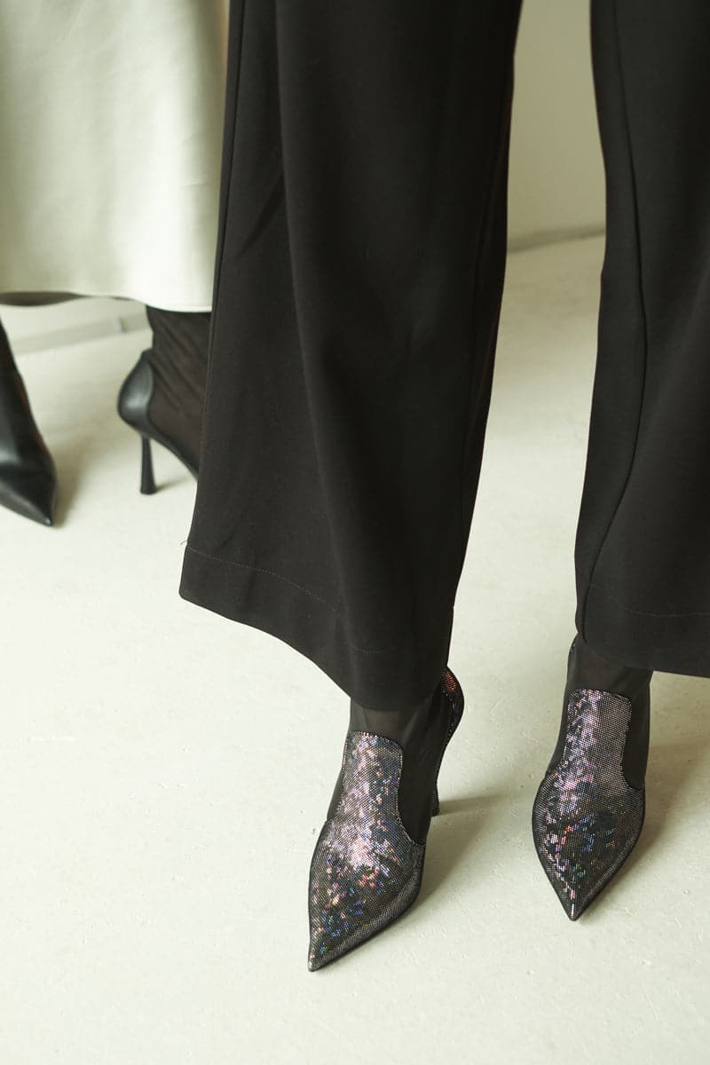 Black disco suede heeled boots by House of Atana, featuring a stylish design and pointed toe, size EU 35.