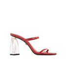Red patent glass mules sandals by House of Atana, featuring sleek design and comfortable slip-on style.