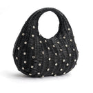 Emm Kuo Hudson raffia top handle bag in black wicker with a structured shape and elegant design.