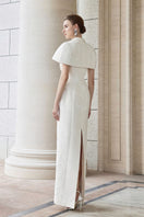 White long gown-coat with mini cape by I.H.F, elegant evening dress with layered design and sleek silhouette.