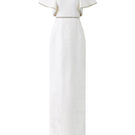 White I.H.F gown with round neckline and exaggerated shoulder design, shown in a close-up image.