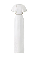 White I.H.F gown with round neckline and exaggerated shoulder design, shown in a close-up image.