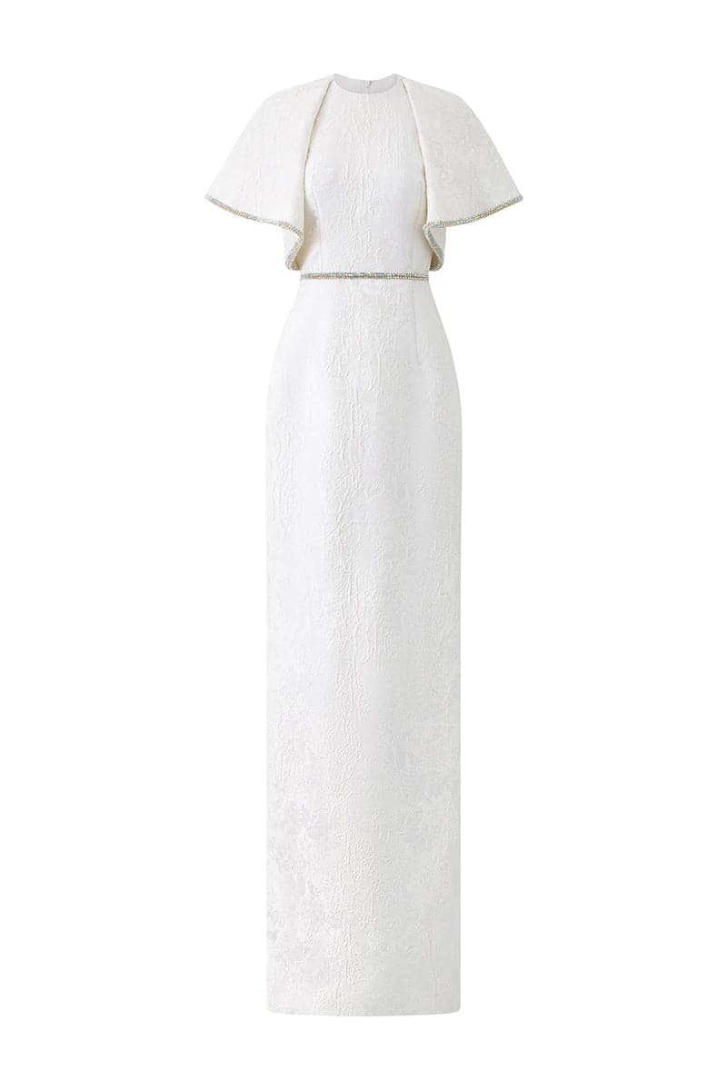 White I.H.F gown with round neckline and exaggerated shoulder design, shown in a close-up image.