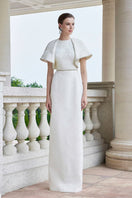 White I.H.F round neck gown with exaggerated shoulders, stylish and elegant, perfect for formal occasions.