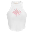 Light pink IKINITA Sunrise Top displayed on a hanger, showcasing its soft fabric and stylish design.