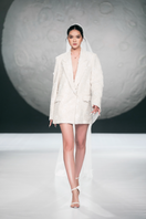 Ivory tweed suit blazer by HACCHIC COUTURE featuring classic tailored design and textured fabric on a hanger.