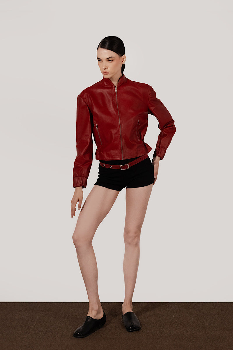 Red Bennett leather jacket by Double A, featuring a classic design with visible stitching and a stylish collar.