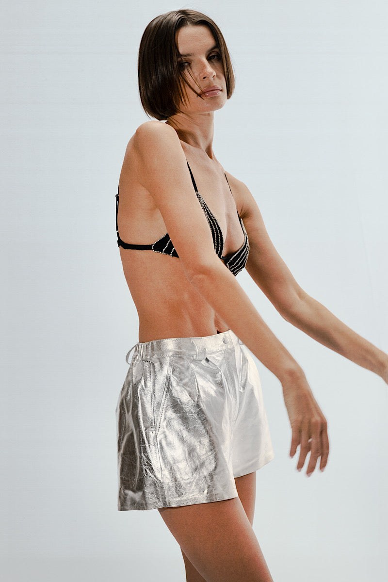 Silver leather shorts by Double A, moonbow design, with a close-up view of the textured leather material and stylish fit.