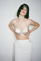 Nué ELLE Bullet Bra in crystal, showcasing the delicate lace and crystal embellishments of the stylish bra on a model.