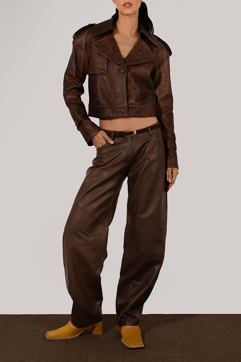 Double A Audax leather jacket with snake print, stylish and textured in a close-up image showing the leather details and pattern.