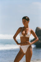 Oceanus Stella Ocean bikini top in white, featuring a stylish design with adjustable straps and supportive fit.