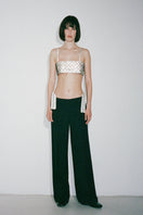 Nué Charlotte Polka-Dot Crystal Top featuring a stylish design with polka-dot pattern and sparkling crystal accents.