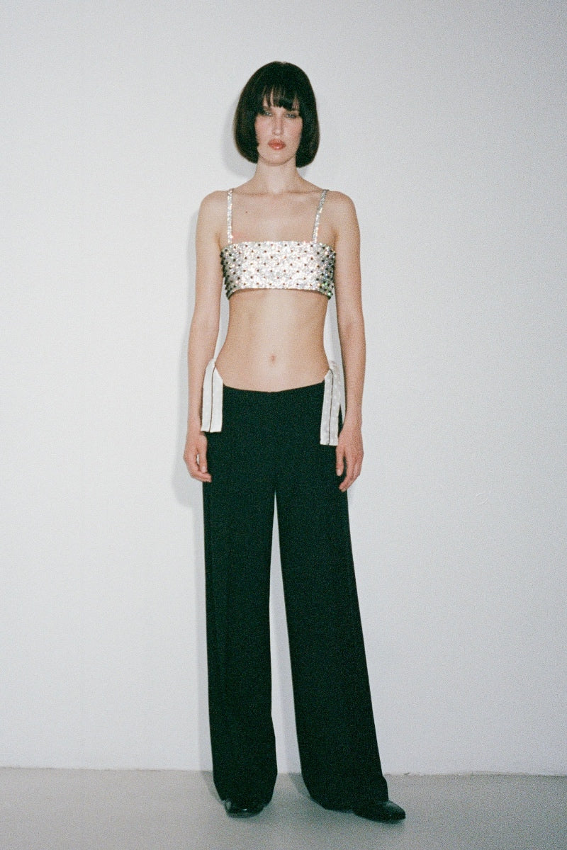 Nué Charlotte Polka-Dot Crystal Top featuring a stylish design with polka-dot pattern and sparkling crystal accents.